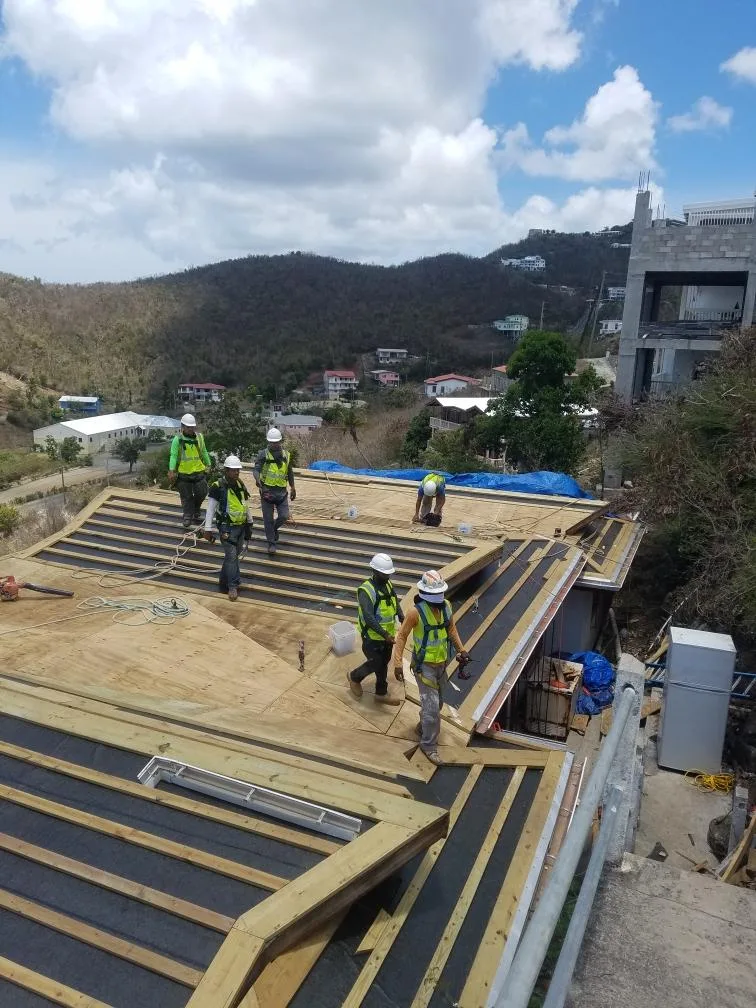 Lamar crew performing elevated housing construction work